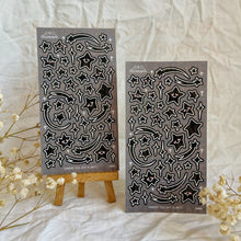 Load image into Gallery viewer, black with white outline star doodles sticker sheet